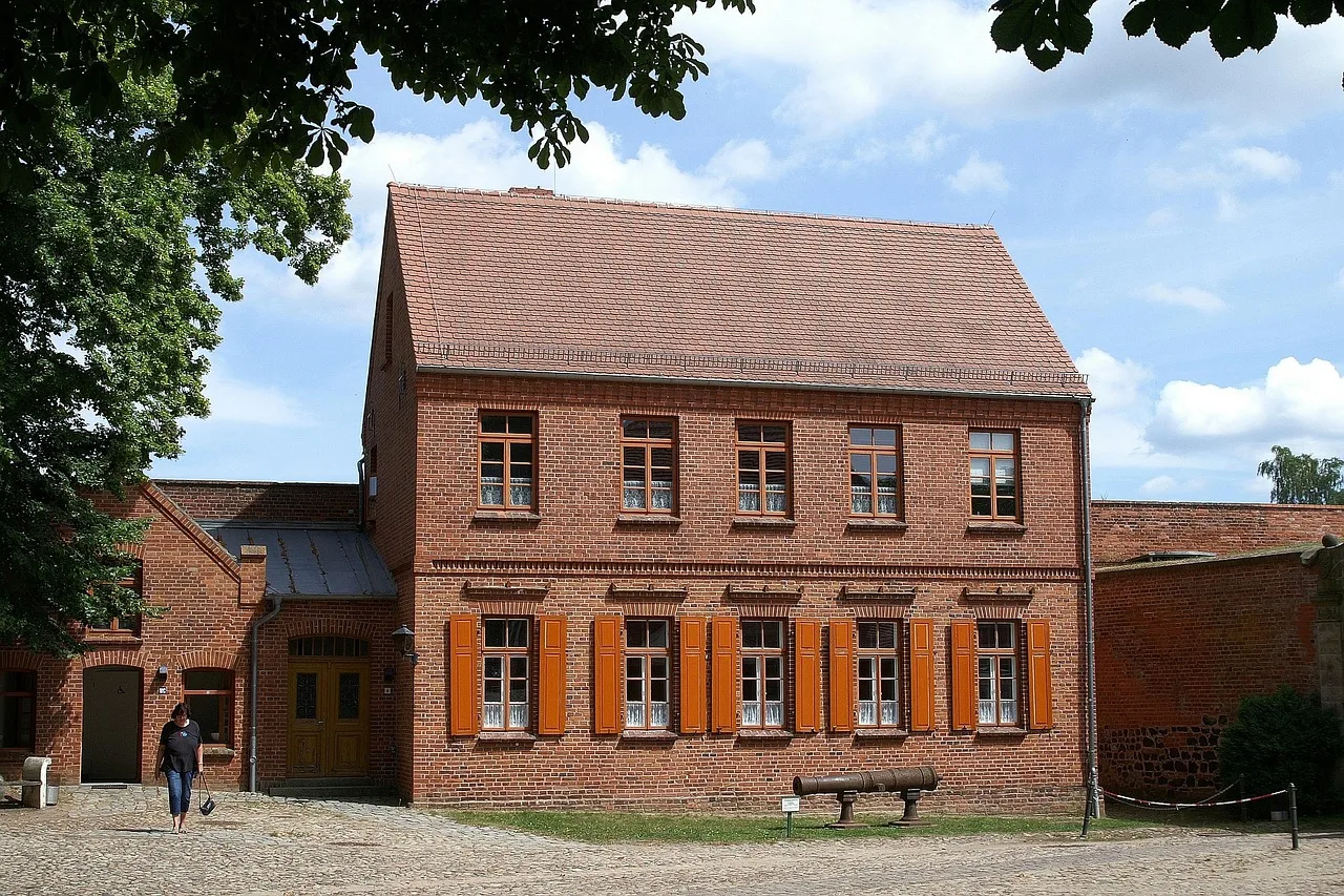 fortress, building, museum, person, entrance, road, nature, trees, garden, facade, urban. Unusual museums: what to confirm before a visit